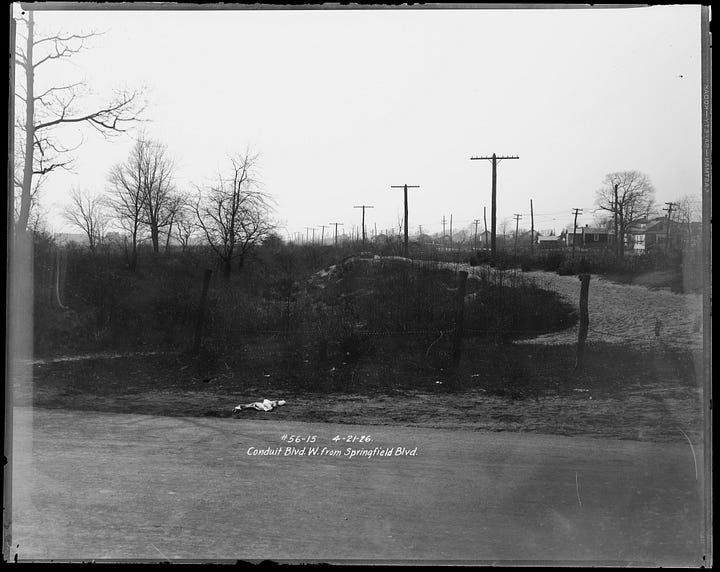 Images show Springfield, Queens, in the 1920s. Three images show tree-lined roads with autos and signs advertising new housing.