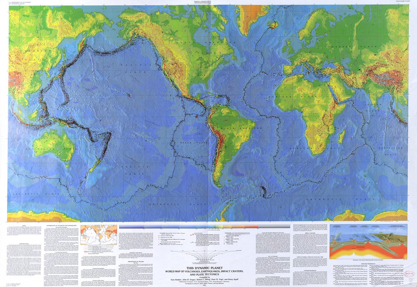 World map with oceans as blue and land as with topographic colors. Shows outlines of plates, and locations of volcanoes.