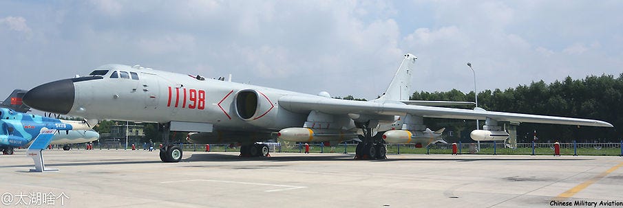 A PLAAF H-6K bomber carrying a mixed load of KD-63 and KD-20 air-launched cruise missiles A PLAAF H-6K bomber carrying a mixed load of KD-63 and KD-20 air-launched cruise missiles