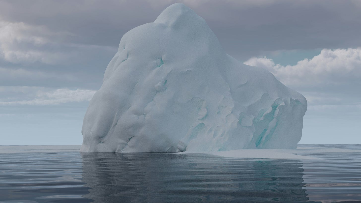 A glacier in the middle of a large body of water.