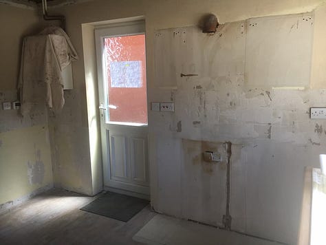 Bare kitchen after all the units have been removed