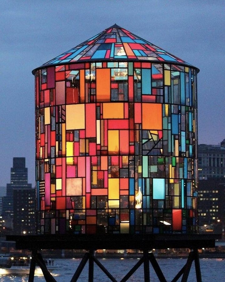 Two bold colorful stained glass artworks