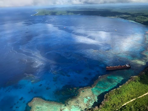 A large oil slick emanates from the the MV Solomon Trader after it ran aground near Rennell Island on Feb. 5. The oil has contaminated the ecologically delicate area in the Solomon Islands. Image courtesy of Australian Dept of Foreign Affairs & Trade. A large oil slick emanates from the the MV Solomon Trader after it ran aground near Rennell Island on Feb. 5. The oil has contaminated the ecologically delicate area in the Solomon Islands. Image courtesy of Australian Dept of Foreign Affairs & Trade.