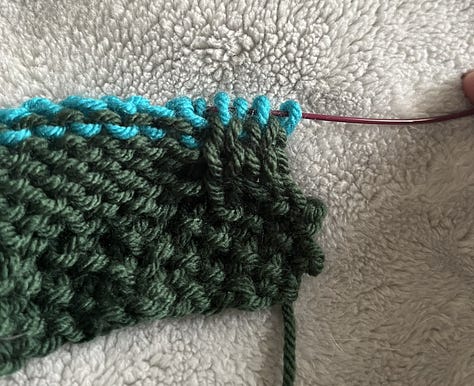 Knitting stitches on needle