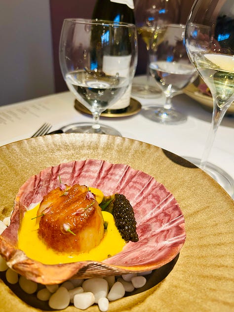 Snapshots of a tasting menu at Indienne in Chicago. Small plates with colorful food and a snapshot of the menu itself listing interesting twists on haute Indian cuisine as prepared by Chef Sujan Sukar