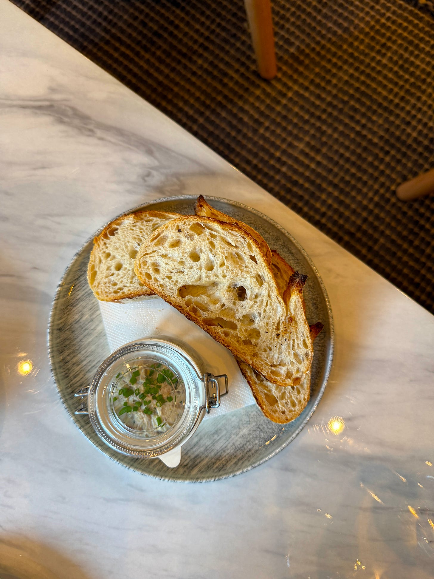 birds eye view of a plate of toast and mackerel pate at cru didsbury