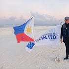 Civilians plant the Philippine flag in a disputed feature in the South China Sea