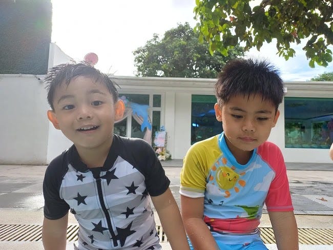 Miguel and Rafa swimming together Miguel and Rafa swimming together