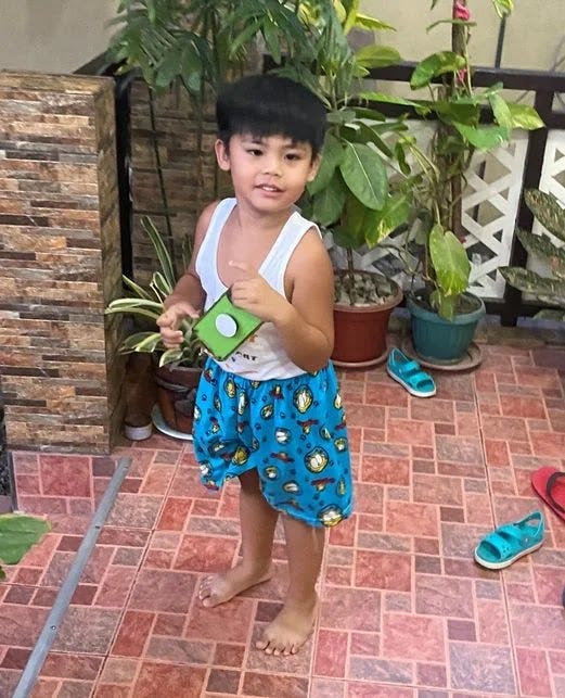 Our little boy Miguel smiling happily Our little boy Miguel smiling happily