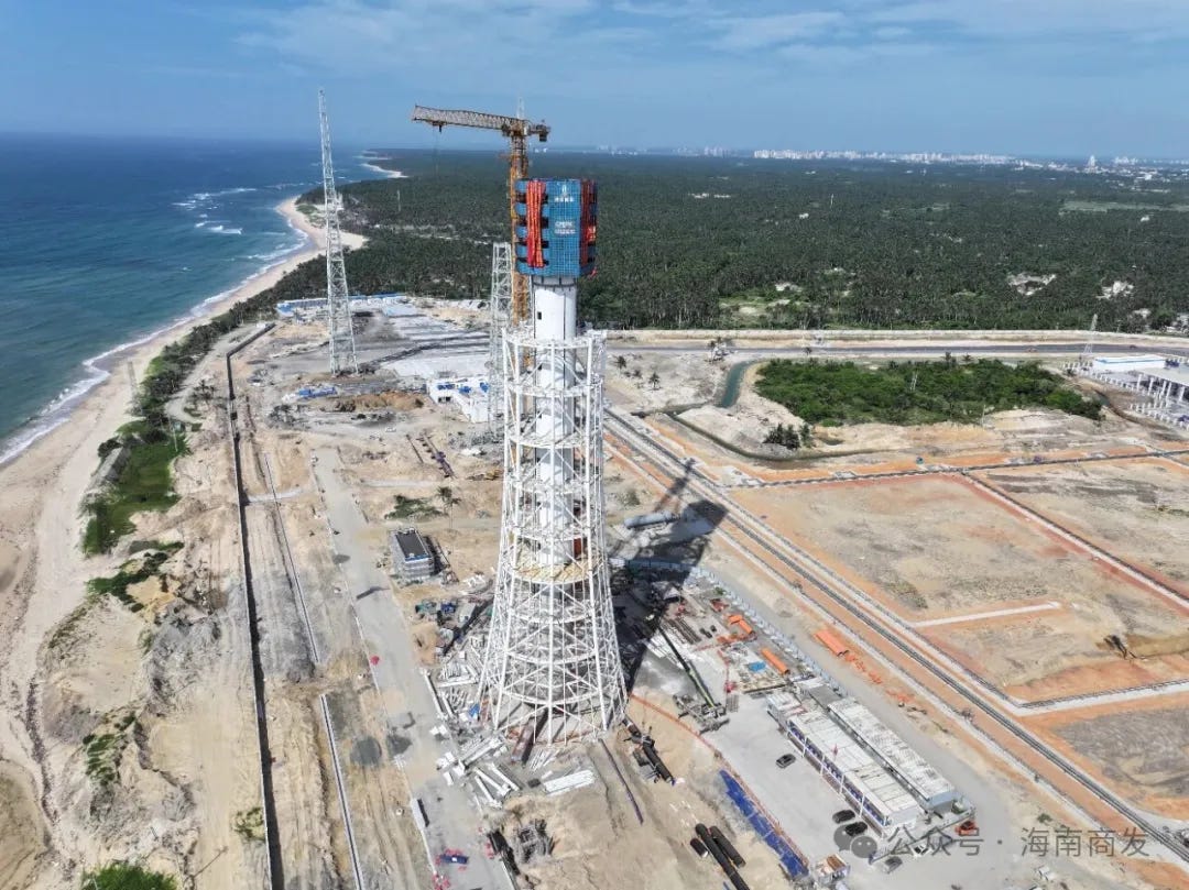 The water deluge tower for Commercial Launch Pad 3 and 4 being worked on in June 2026.