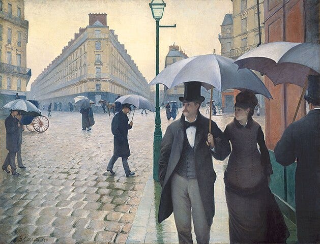 An atmospherically rainy street scene in Paris, with elegantly-dressed couples sharing umbrellas as they walk over the rain-slick cobblestones under a blank sky. You can practically smell the petrichor. An atmospherically rainy street scene in Paris, with elegantly-dressed couples sharing umbrellas as they walk over the rain-slick cobblestones under a blank sky. You can practically smell the petrichor.