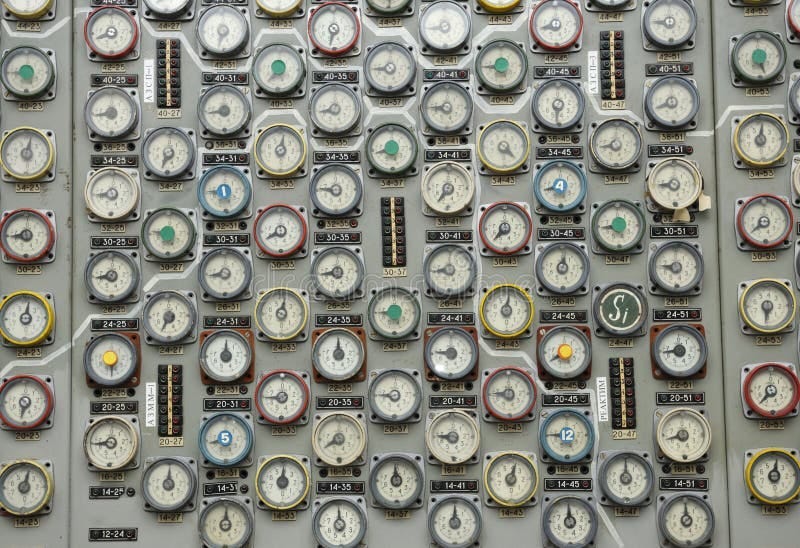 A wall of analog gauges with numbered labels