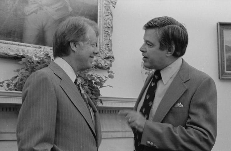 Senator Church, right, with President Carter on August 12, 1977. Senator Church, right, with President Carter on August 12, 1977.