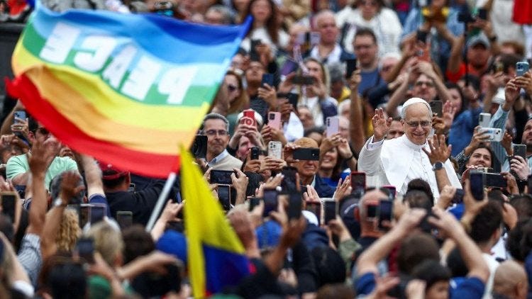 FILE PHOTO: Pope Leo XIV during his first General Audience, where the faithful wave a peace flag