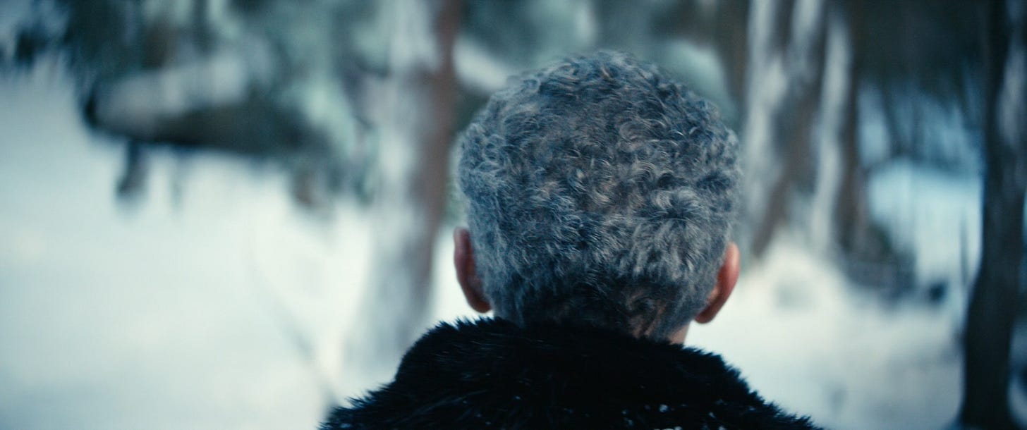 Innie Irving walking away at the end of the episode Woe's Hollow