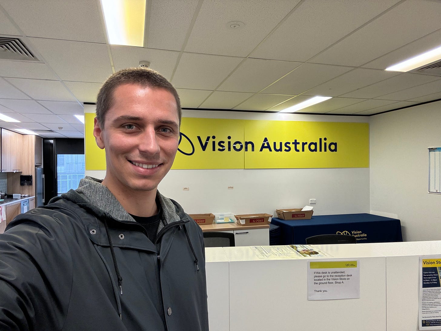 Mael, co-founder, in a low-vision store from Vision Australia