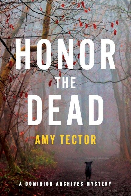 Photo of a book cover featuring misty autumn forest with a dog in the right hand corner. Title reads Honor the Dead, Amy Tector, A Dominion Archives Mystery