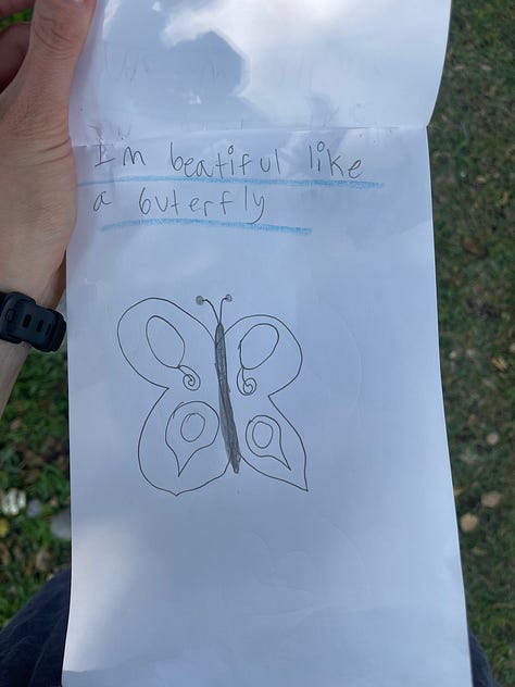 Different pages from "The Book of Good Feelings" a hand drawn book by a child