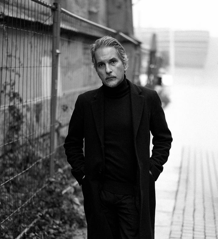 photo of abul mogard and his album cover