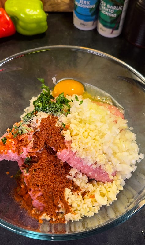 Photo 1: Overhead side shot of jerk chicken meatballs in a rich tomato sauce Photo 2: Tomato sauce cooking in a pan with teaspoonfuls of seasoning powder Photo 3: Two bowls of linguine pasta with the meatballs and tomato sauce with a small coating of grated parmesan cheese