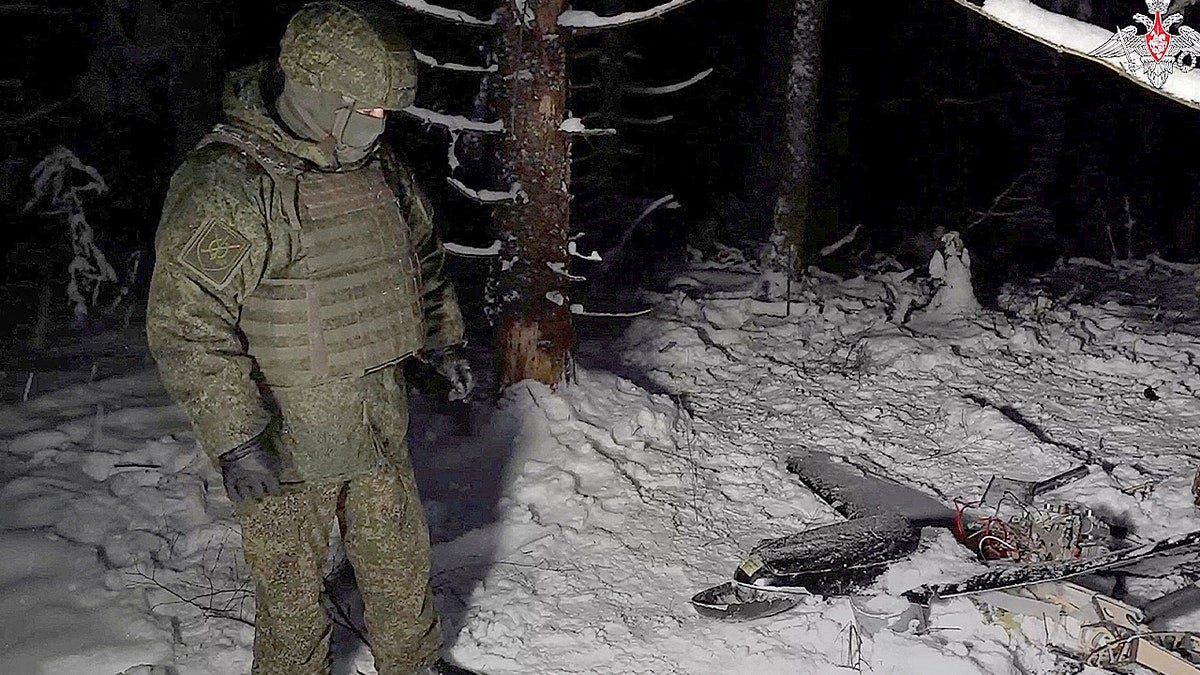 drone and russian serviceman