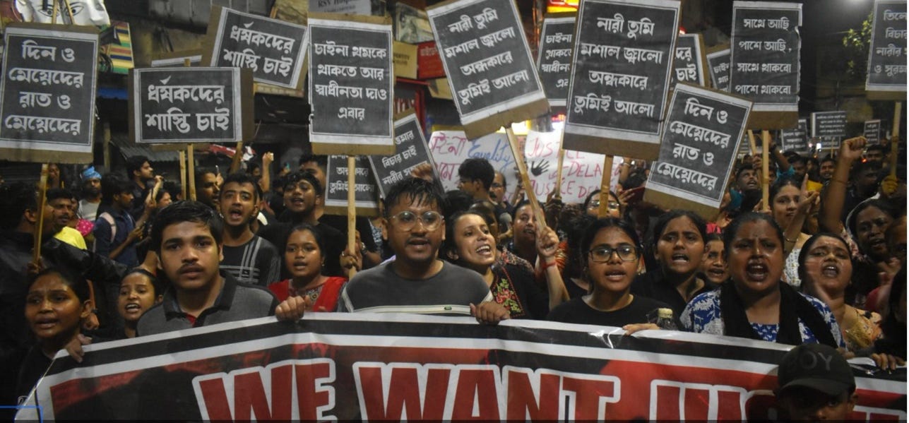 A group of people holding signs

AI-generated content may be incorrect.