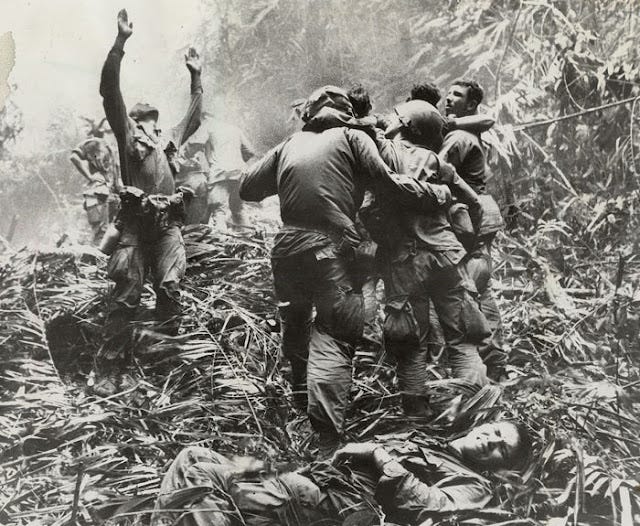 A picture containing text, outdoor, old, group

Description automatically generated