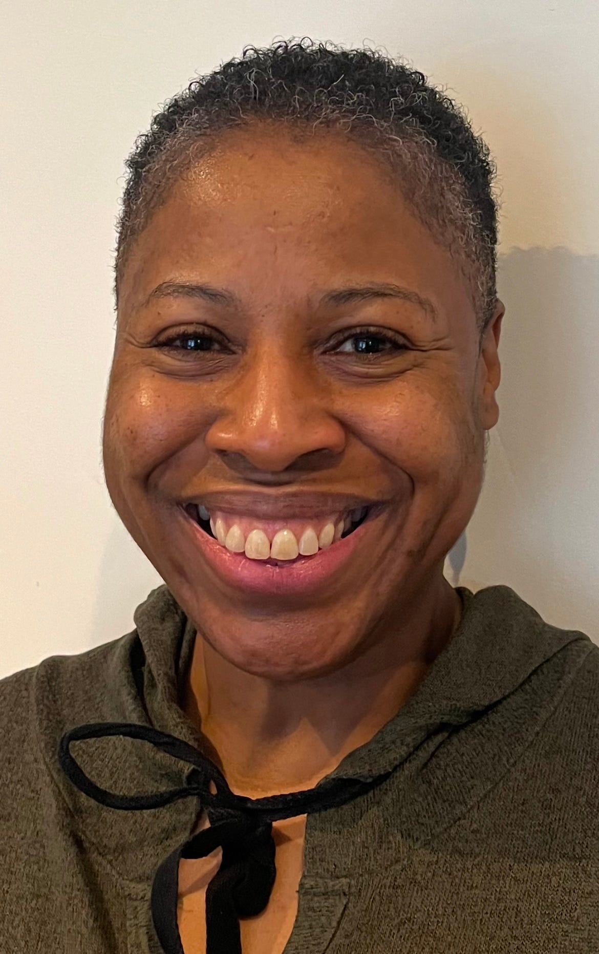 Smiling Black lady.
