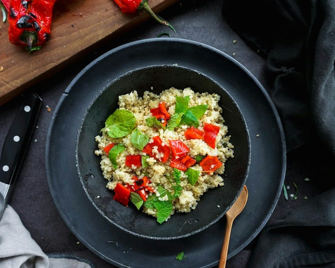 cooked riced with green leafy
