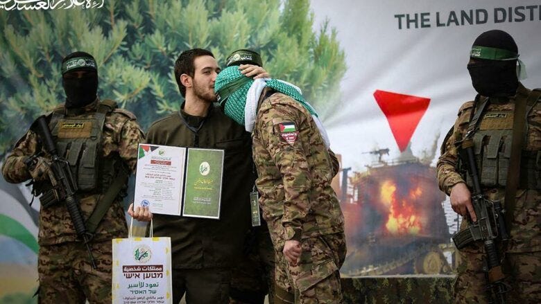 Israeli hostage kisses Hamas fighter on the forehead during his release
