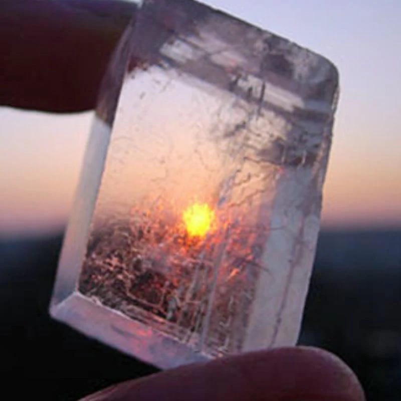 Viking sunstone held up to the light, a navigational crystal used to find direction at sea, echoing the metaphor invoked in Lucy Rose’s Tarot DMs interview as she reflects on guidance, intuition, and plotting a creative course through uncertainty after the success of The Lamb.