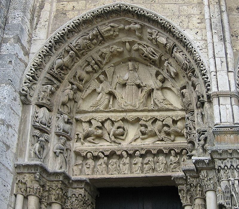 West portal, tympanum of left door. It depicts Christ on a cloud, supported by two angels, above a row of figures representing the labours of the months and signs of the Zodiac[33]