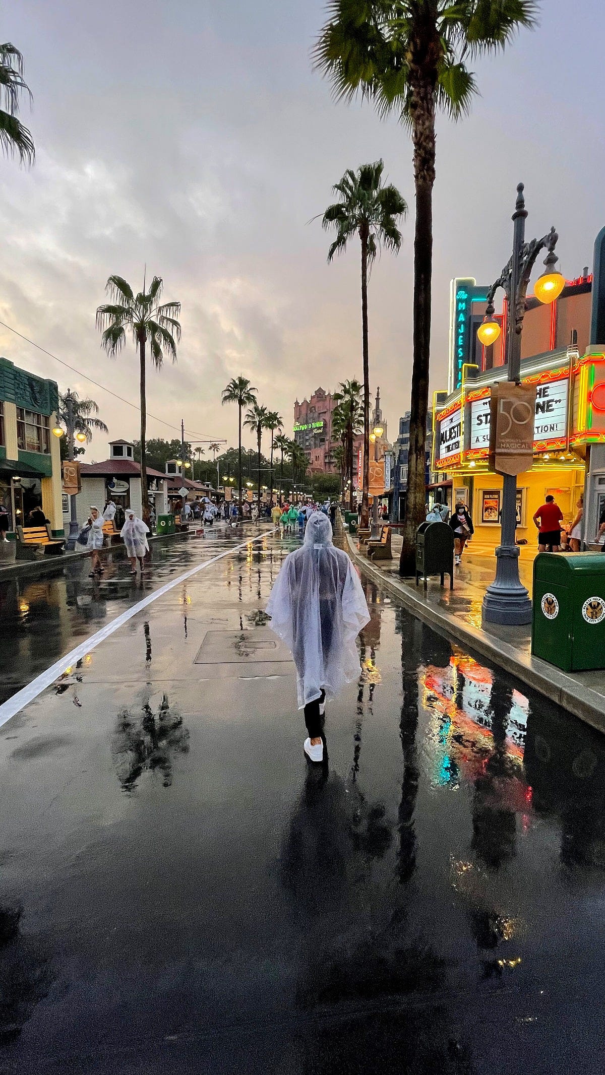 A guest in a poncho walks a rainy Hollywood Boulevard. Image: OfTheUsername via Wikimedia Commons A guest in a poncho walks a rainy Hollywood Boulevard. Image: OfTheUsername via Wikimedia Commons