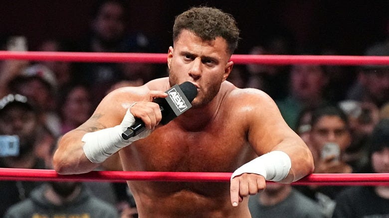 MJF holding microphone