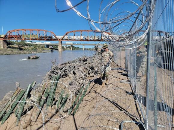 Texas National Guard builds barriers along Rio Grande Texas National Guard builds barriers along Rio Grande