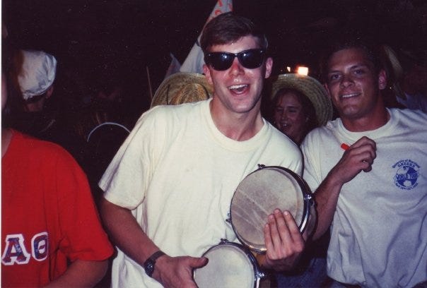 Shawn Collins playing the bongos during Greek Week 1991
