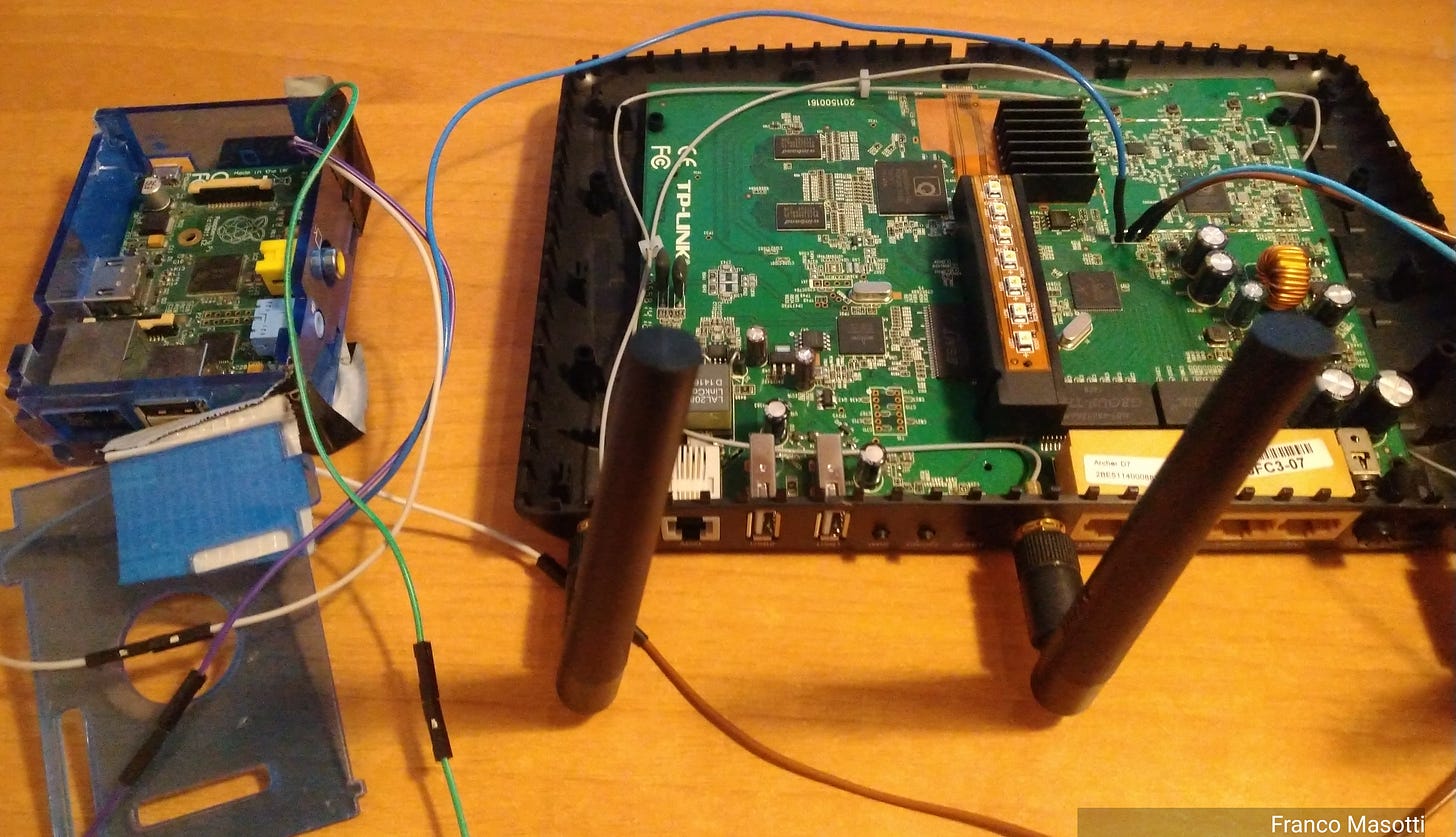 Global view of the TP-Link Archer D7 and the Raspberry PI 1 model B connected with jumper wires