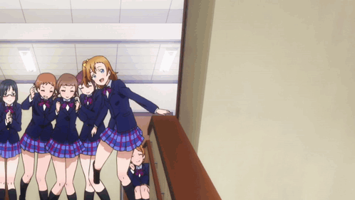 a group of anime girls are posing for a picture in a hallway a group of anime girls are posing for a picture in a hallway