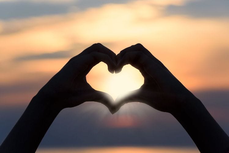 free stock image from Canva showing heart-hands