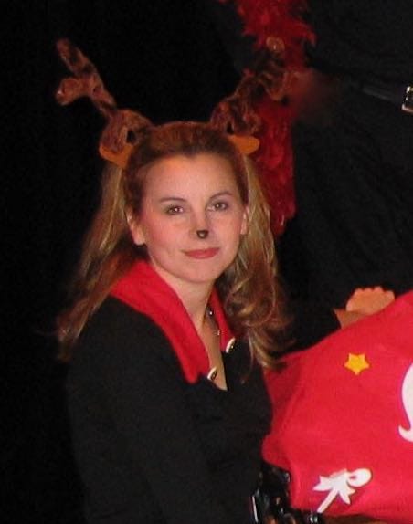 Two programs for amateur theatre comedies, and photo of a woman dressed in black with reindeer antlers.