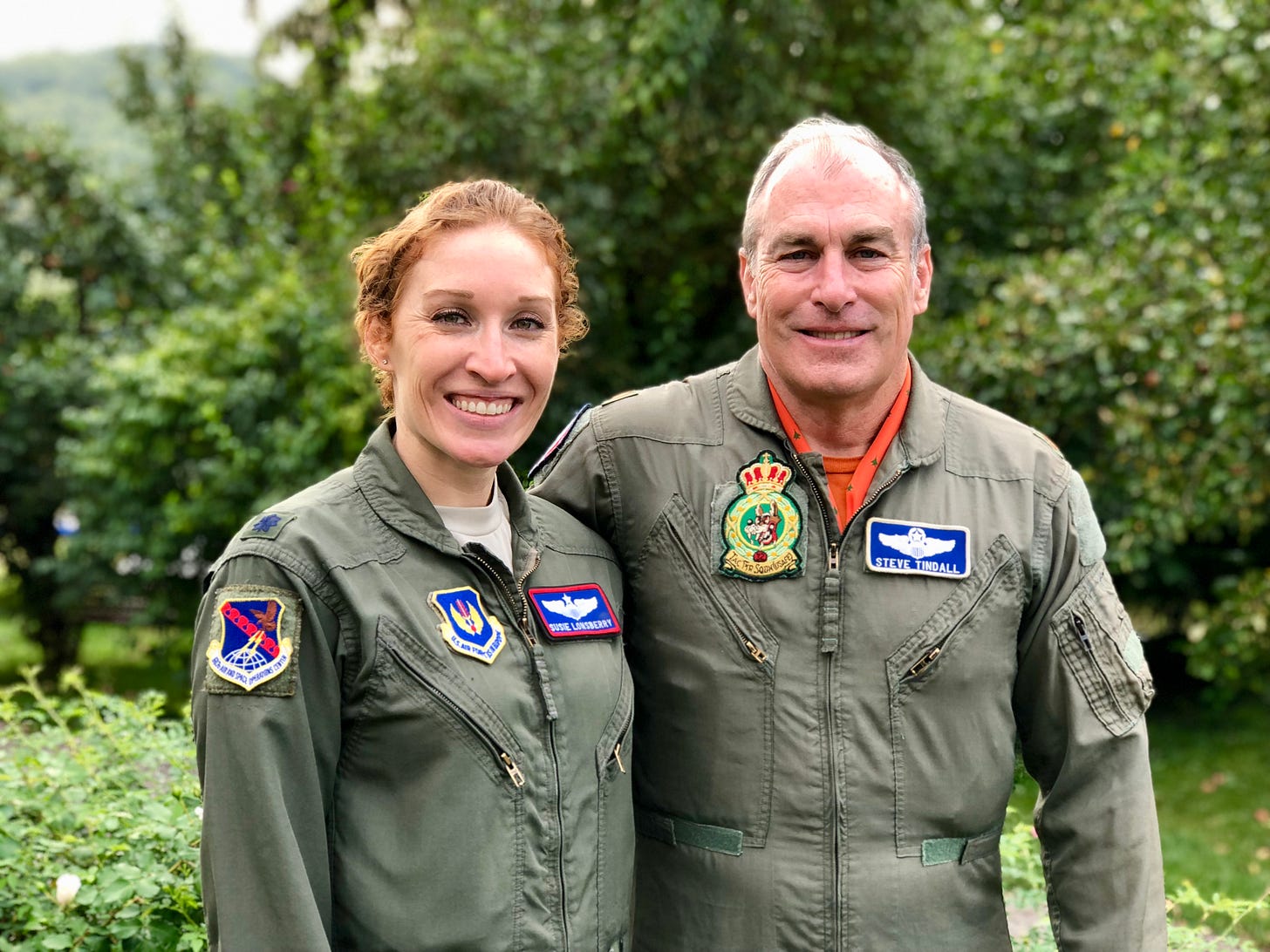 Susie and her DAD in their flight suits in a German garden Susie and her DAD in their flight suits in a German garden