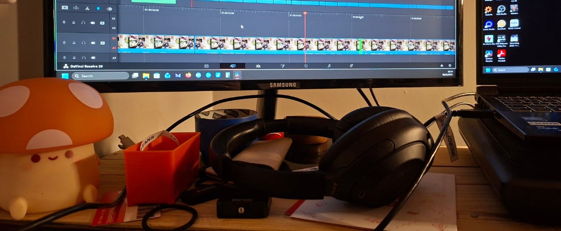 Landscape photo in colour. It is a photograph of the bottom of a computer screen showing the timeline in a video editing software.