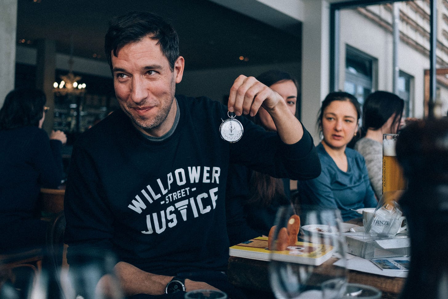 The author holding a stop watch in his hands