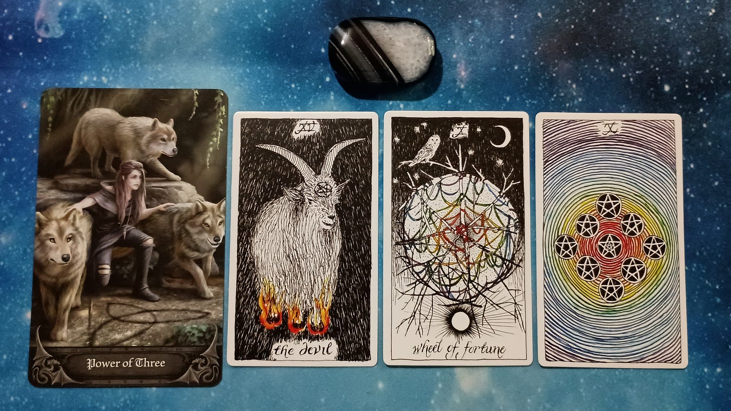 Full Moon Magic: Your August 2025 Pick-a-Card Tarot Reading, Pile 4, Black Agate crystal, and 4 cards, face up Full Moon Magic: Your August 2025 Pick-a-Card Tarot Reading, Pile 4, Black Agate crystal, and 4 cards, face up