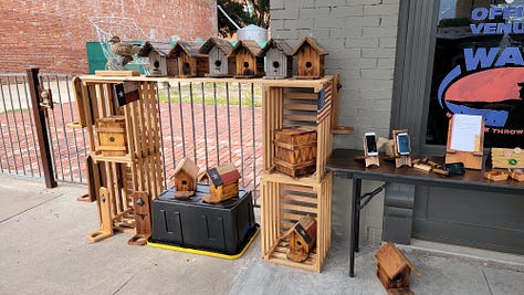 Face painting, the Downtown Farmer's Market, and artists selling their creations