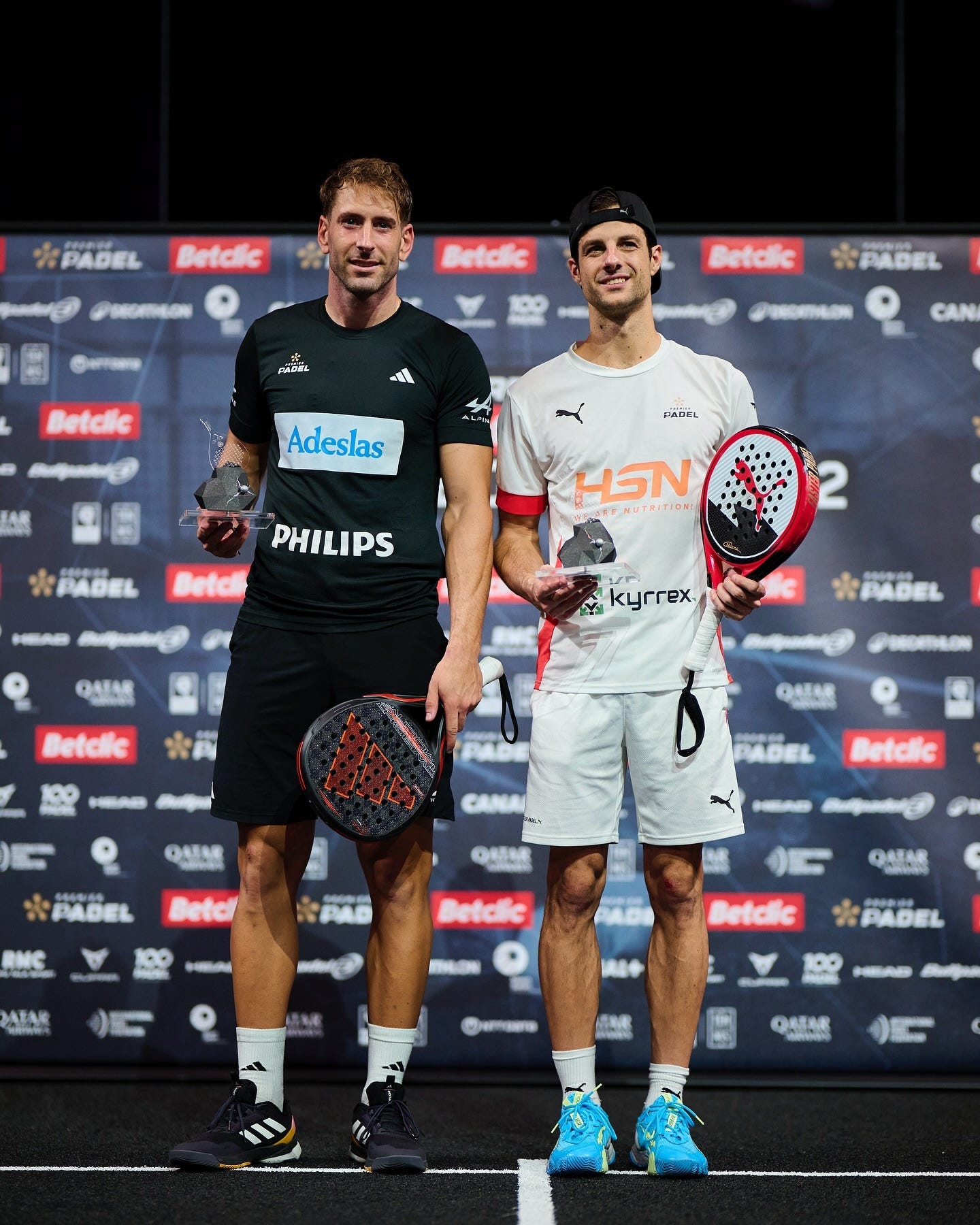 Photo shared by Álex Ruiz on June 16, 2024 tagging @momogonzalez1, @adidaspadel, @philipsspain, @clinicasohailfisioterapia, @alpinecars, @adeslaspadel, and @premierpadel. May be an image of 2 people, people playing tennis, racket, sports equipment and text.