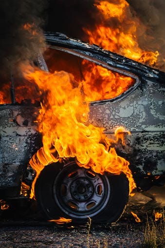 CarInFlames_iStock_AndrisBarbans_sm CarInFlames_iStock_AndrisBarbans_sm