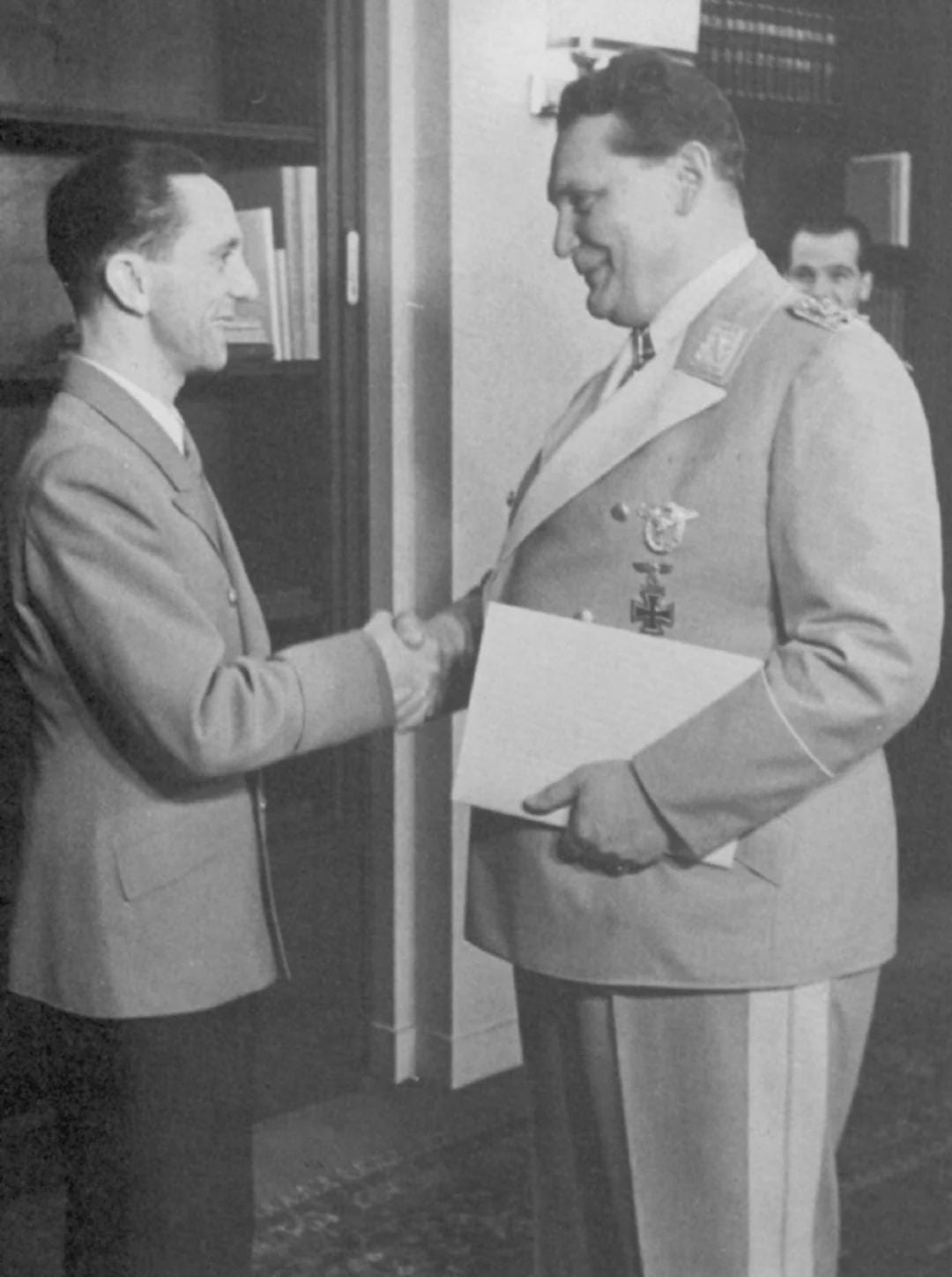 Hermann Goering shakes hands with Joseph Goebbels on January 12, 1941, during Goering's birthday celebration. This moment belied Goebbels's private detestation of Goering, noted in his diary. Hermann Goering shakes hands with Joseph Goebbels on January 12, 1941, during Goering's birthday celebration. This moment belied Goebbels's private detestation of Goering, noted in his diary.