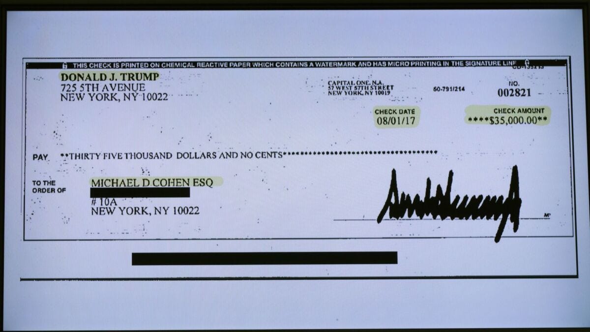Michael Cohen showcases check he says Trump wrote for Stormy Daniels hush  money - Los Angeles Times
