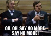 Two men sitting in a room

Description automatically generated